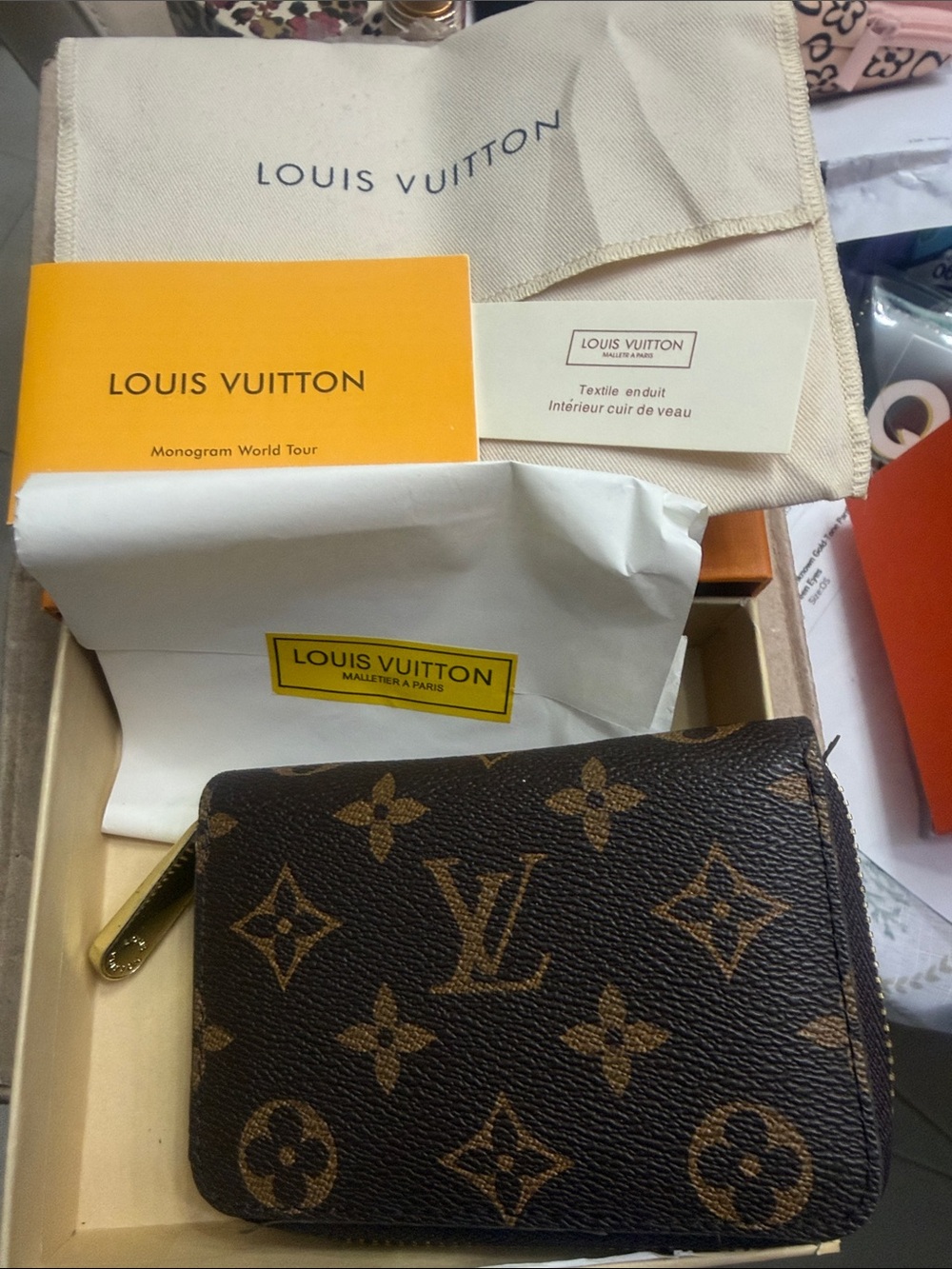 L Brown Monogram Zip Wallet